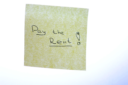 Note by the door Pay Rent