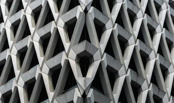 Detail of brutalist concrete diamond shaped facade of the car park in Welbeck Street , London.