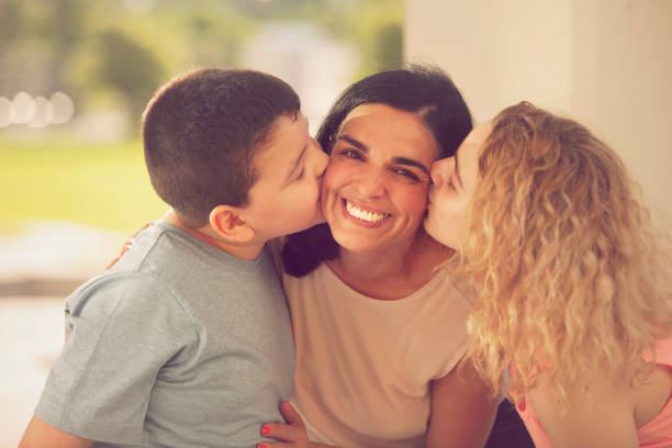 Happy mother with kids