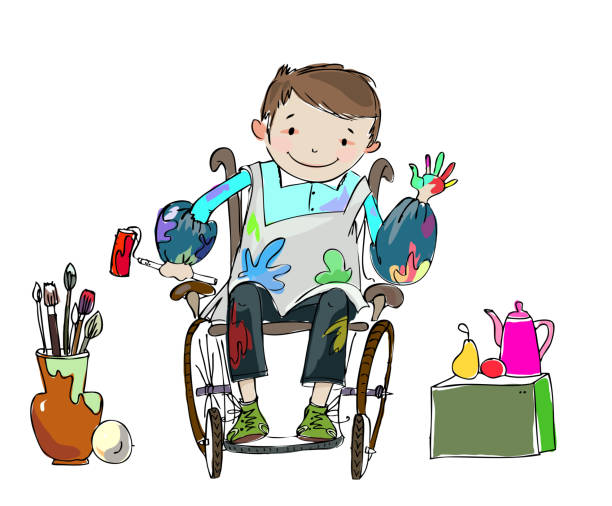 istock Smiling boy in the wheel chair enjoying the art lesson activities. 658288312