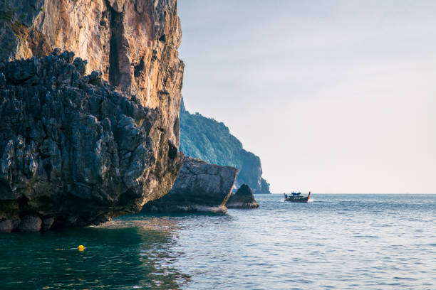 istock Sea, rocks and boat 658288328