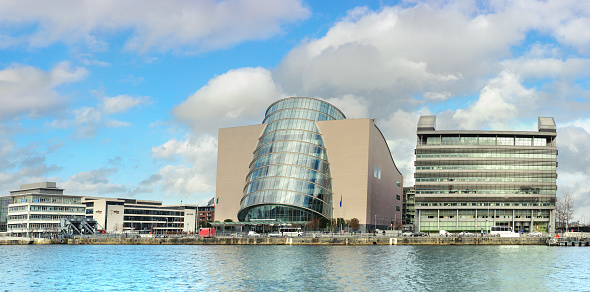 DUBLIN, IRELAND - FEBRUARY 1, 2017: Panoramic image of Convention Centre Dublin (CCD) with reflection on a cloudy day.