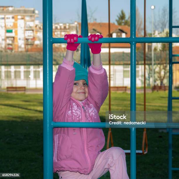 Little Cute Girl Is Playing At Playground Stock Photo - Download Image Now - 4-5 Years, Activity, Casual Clothing