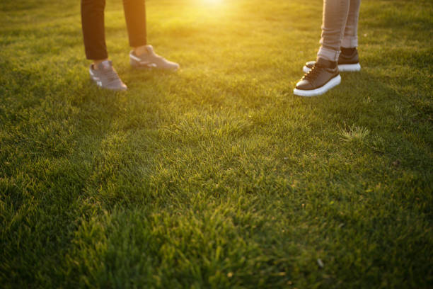 Free Stock Photo of Persons Feet Standing in Grass With Shoes On ...