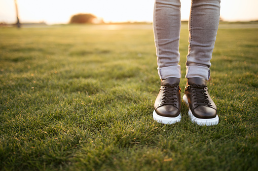 Hipster shoes on grass.