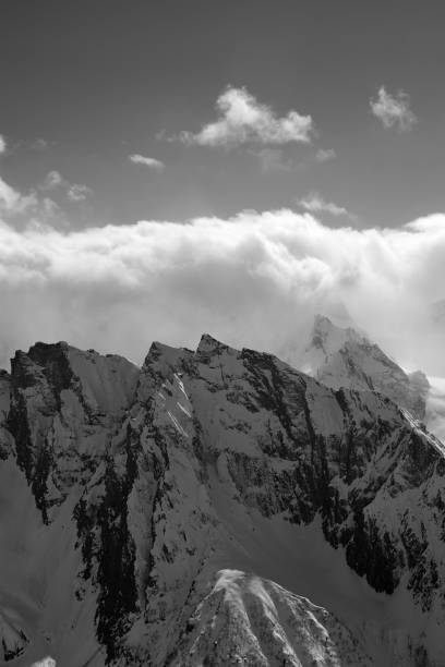 istock Black and white view on high mountain in winter 658304128
