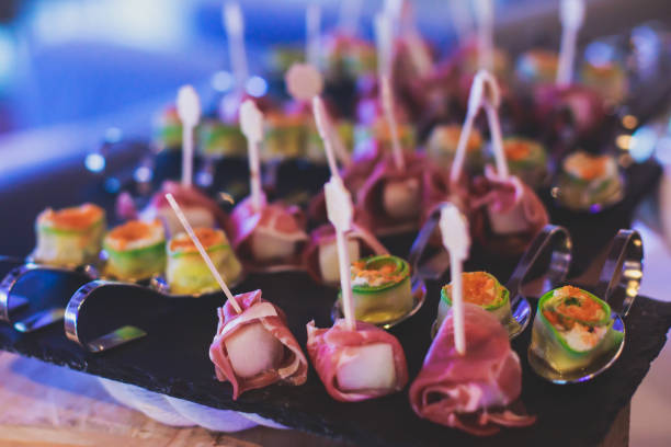 istock Beautifully decorated catering banquet table with different food snacks 658307800