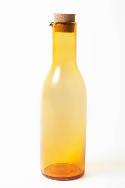 istock Orange color bottle on background 658310428