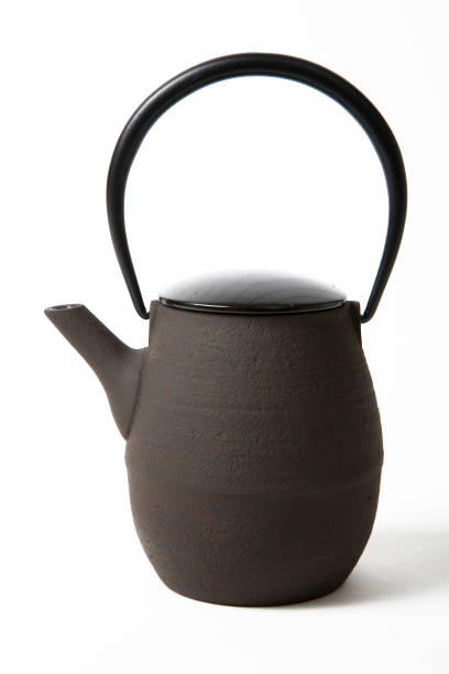 istock Dark Brown color Tea pot on background 658310430
