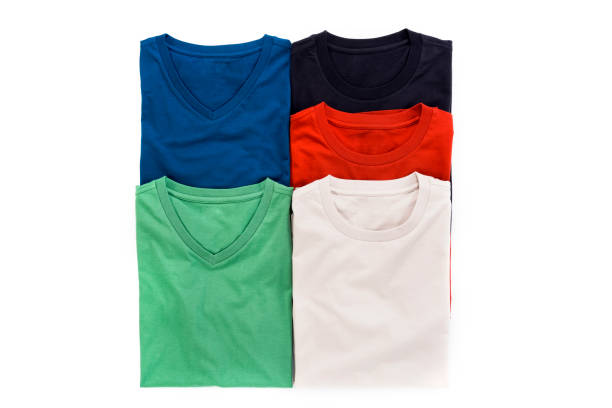 istock Colorful T-shirts folded group on background 658310720
