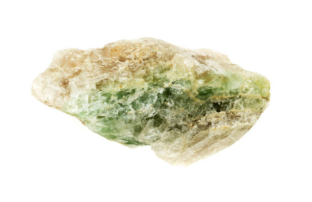 istock Natural rock - green mineral stone on background 658311804