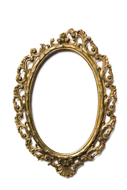 istock Golden oval picture frame on background 658315474
