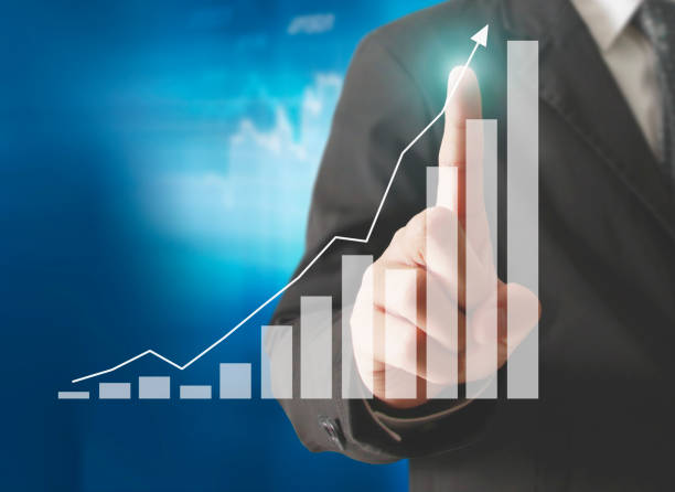 istock financial symbols coming from hand 658322330