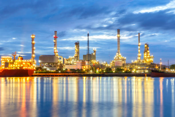 istock Oil refinery at twilight with dark sky background. 658328818