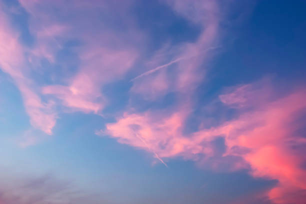 istock Beautiful dramatic Twilight sky and clouds with long line of jet engine cloud. 658329376