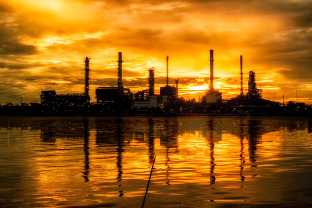 istock Soft focus of oil refinery at twilight 658329934