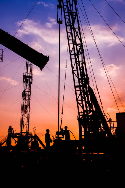 istock oil field, the oil workers are working 658339866