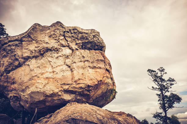 Boulders against sky with cloudy over tranquil nature, outdoor at the daytime. Beauty landscape from national park. Vintage tone effect.