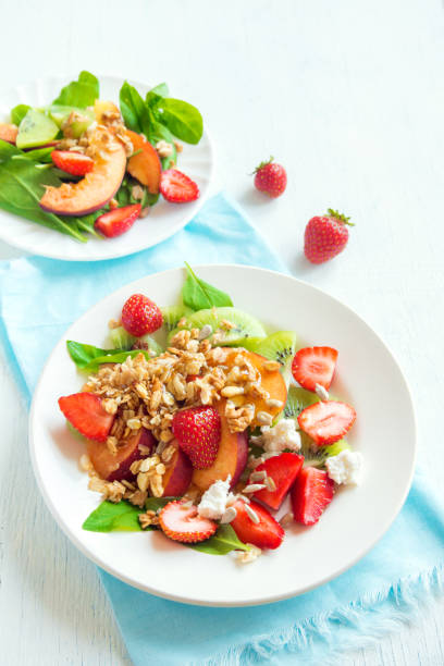 istock fruit salad with homemade granola 658350060
