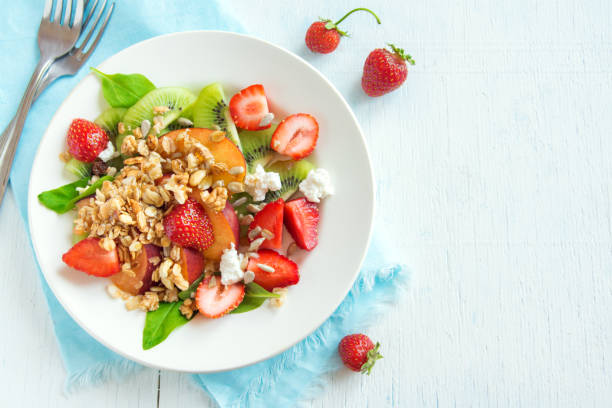 istock fruit salad with homemade granola 658350660