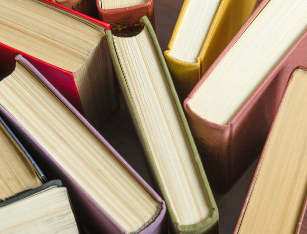 istock a stack of colorful books in a library 658351310