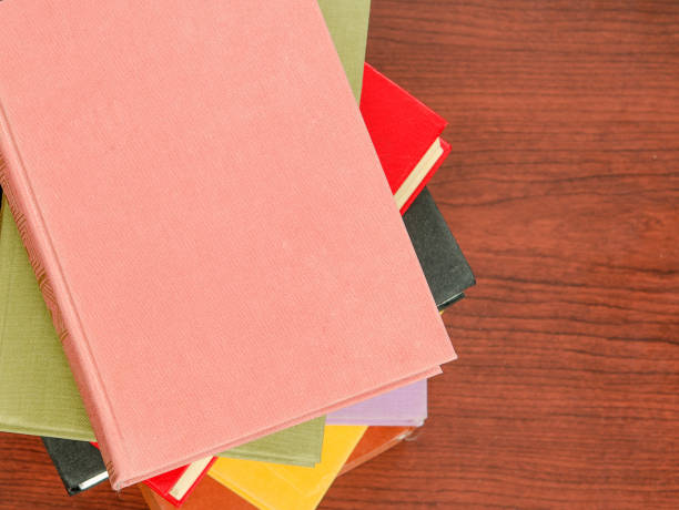 istock a stack of colorful books in a library 658351314