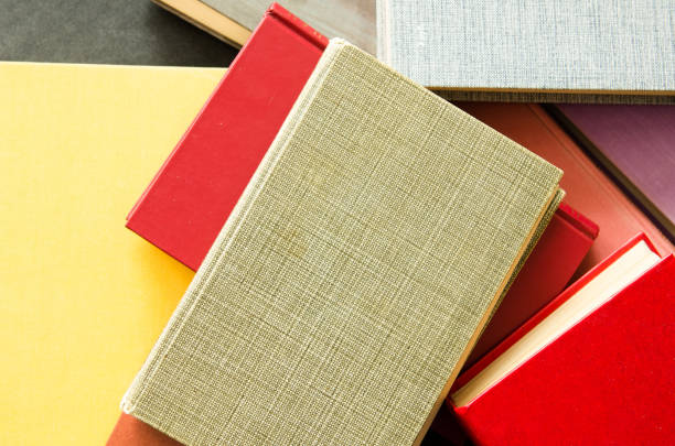 istock a stack of colorful books in a library 658351358