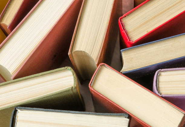 istock a stack of colorful books in a library 658351402