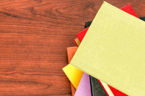 istock a stack of colorful books in a library 658351452