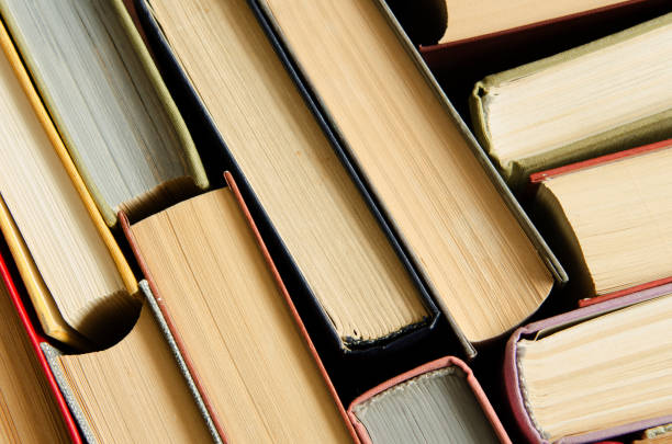 istock a stack of colorful books in a library 658351454