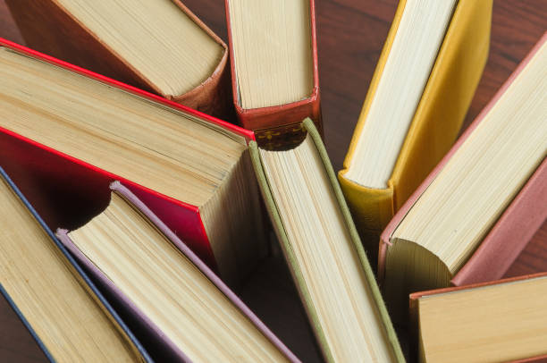 istock a stack of colorful books in a library 658351582