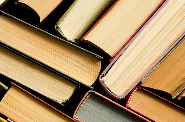 istock a stack of colorful books in a library 658351590