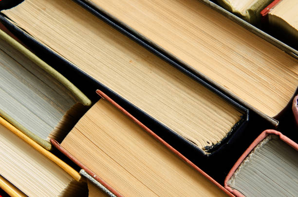 istock a stack of colorful books in a library 658351622