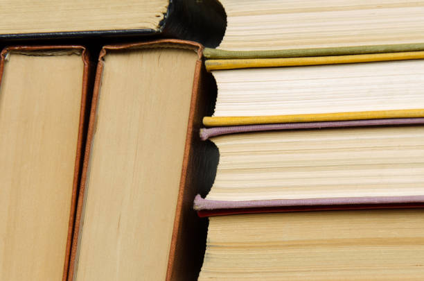 istock a stack of colorful books in a library 658351782