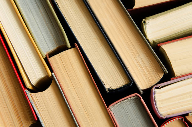 istock a stack of colorful books in a library 658351934