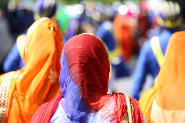 Photo of Sikh women with veils over their heads during the procession in