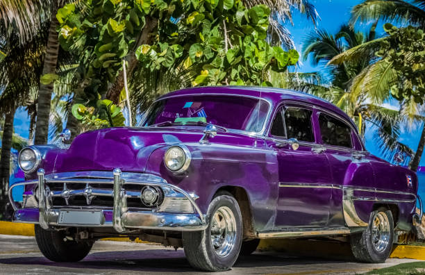 American purple beautiful vintage cars parked in Varadero Cuba stock photo