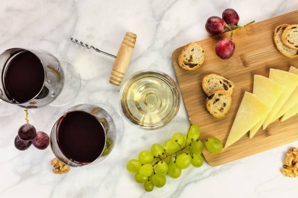 istock Glasses of red and white wine at tasting 658367800