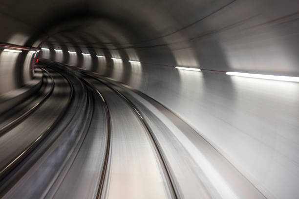 istock Blurred motion subway moving into tunnel, abstract background 658370732
