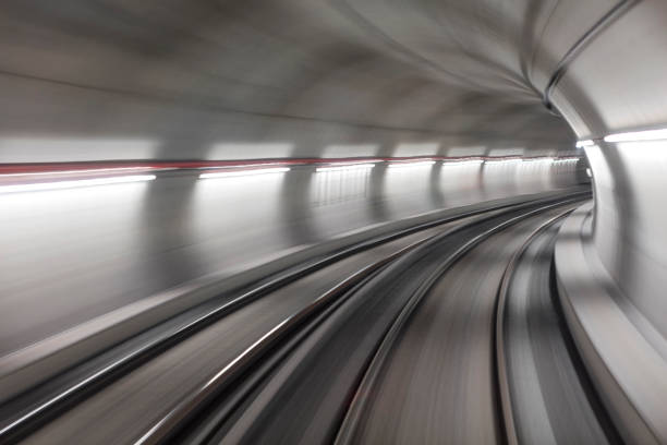istock Blurred motion subway moving into tunnel, abstract background 658374658
