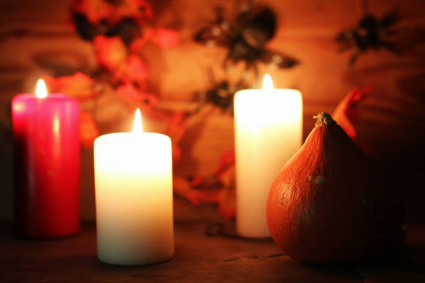istock table decorations for Halloween carved pumpkin head candles 658381764