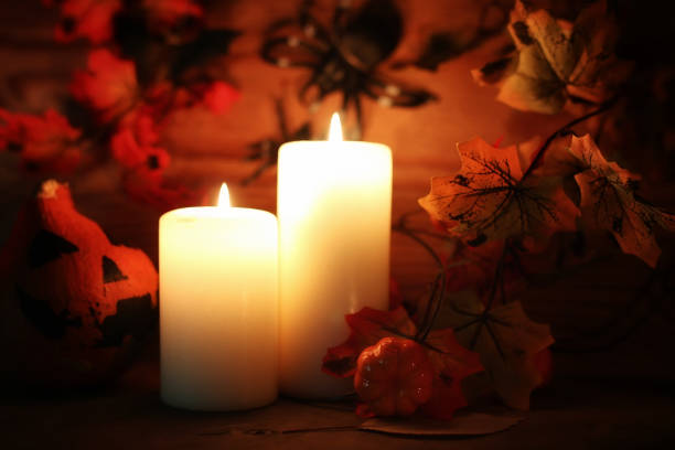 istock table decorations for Halloween carved pumpkin head candles 658382084