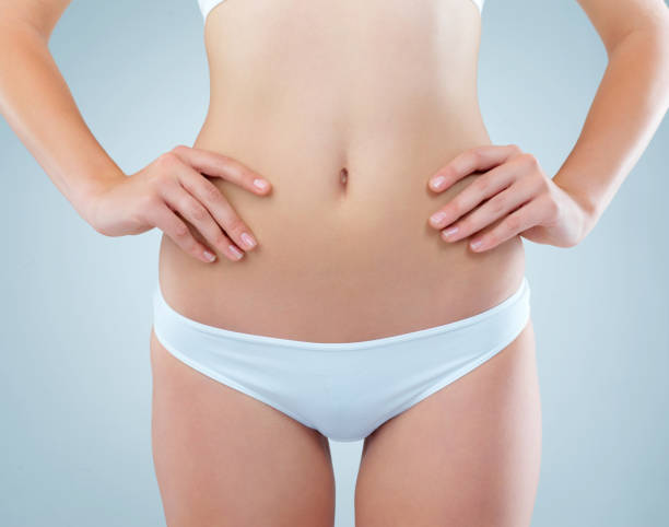 Treat Your Body Like The Temple It Is Stock Photo - Download Image Now -  Low Section, Abdomen, Only Women - iStock