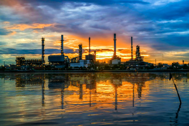 istock Soft focus of oil refinery at twilight 658384220