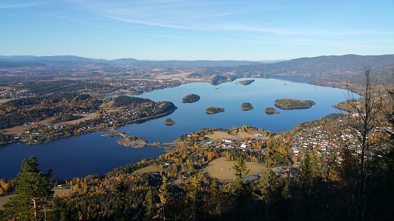 view of Sundvollen, Norway in the fall on a beautiful day with blue sky