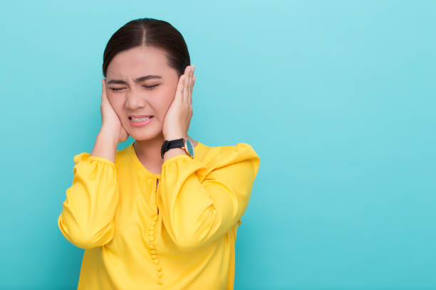 istock Asian woman close her ears 658390792