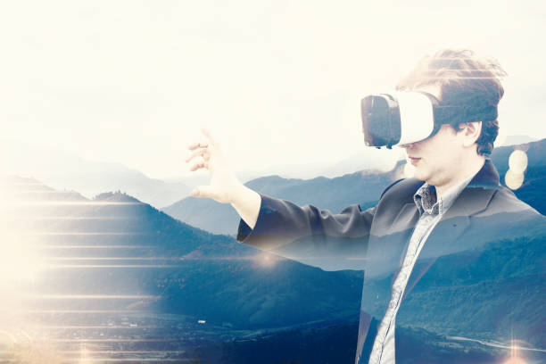 istock double exposure of young man with VR glasses 658396392