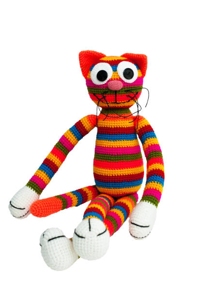 istock Knitted toy - striped sitting cat. 658396802