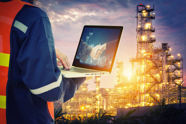 istock Service engineer working with laptop in Oil Refinery 658400632