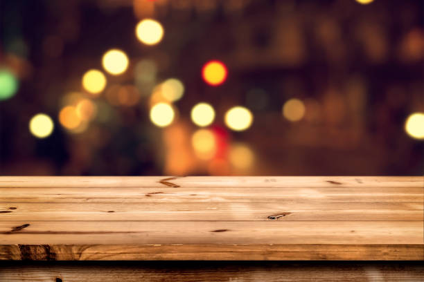 istock wood table top on bokeh background 658403662